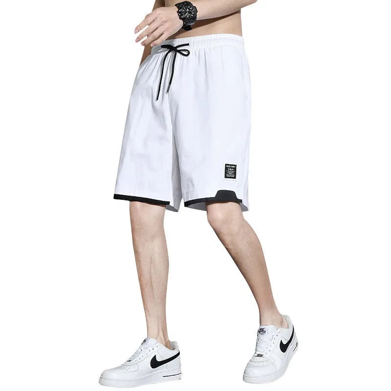 Cotton shorts for boys in black, khaki, or white with mid-waist design and shorts length