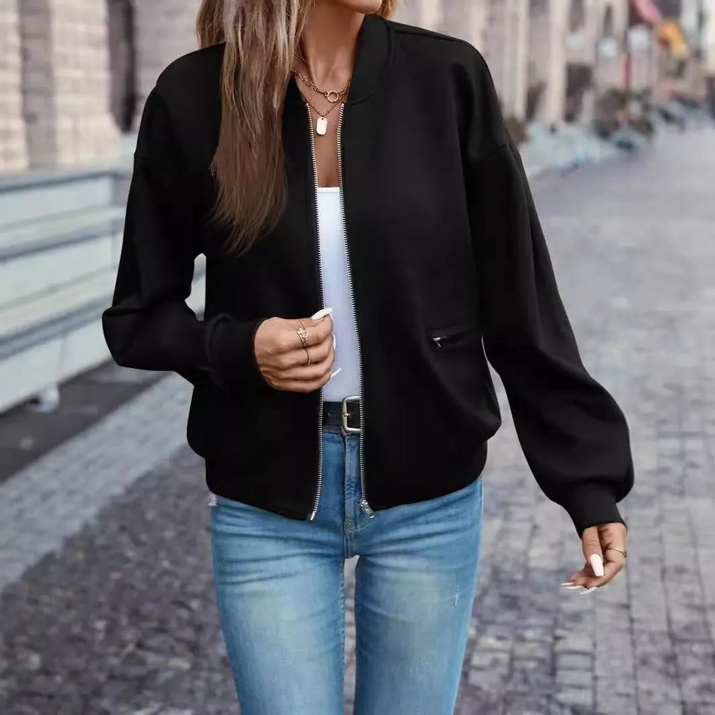 Black polyester zip jacket with long sleeves and faux pockets for women, sized S to XXL.