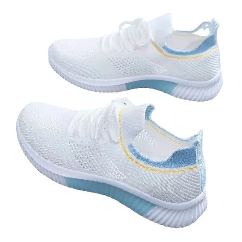 Breathable flyknit low top trainers with mesh upper, cotton lining, PVC sole and front lace-up in pink, blue or black