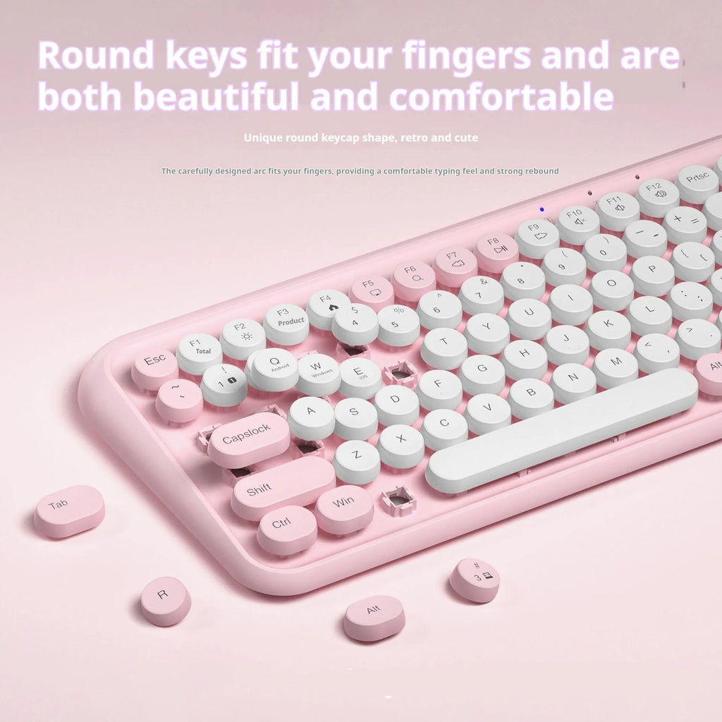 Pink wireless Bluetooth keyboard with 84 keys measuring 339mm wide, featuring crater architecture buttons for quiet typing