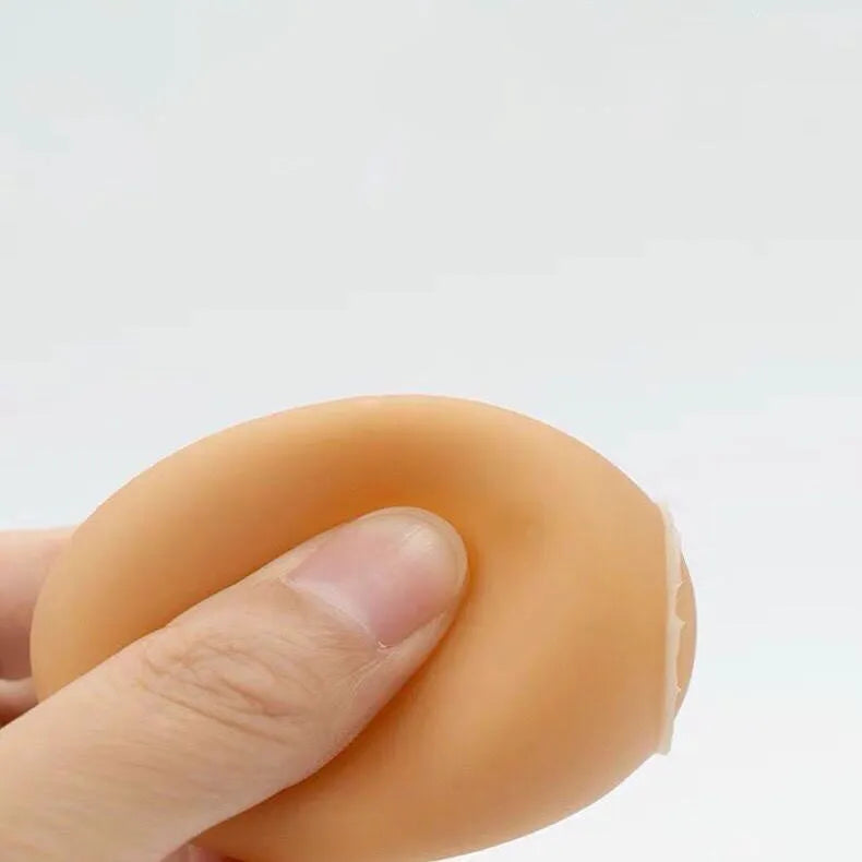 Simulation egg-shaped dog chew toy with squeaker sound for dental play