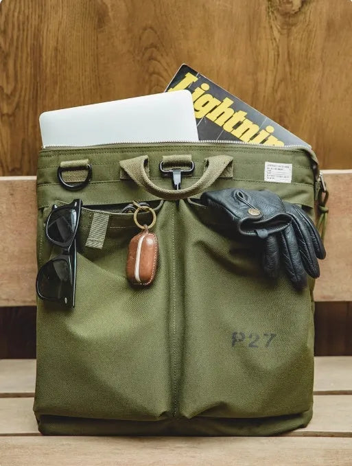 Marden Tooling Helmet Canvas Crossbody Bag in charcoal black showing vertical square shape and shoulder strap