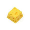 Yellow resin cheese key cap with 3D sculpted texture for mechanical keyboards