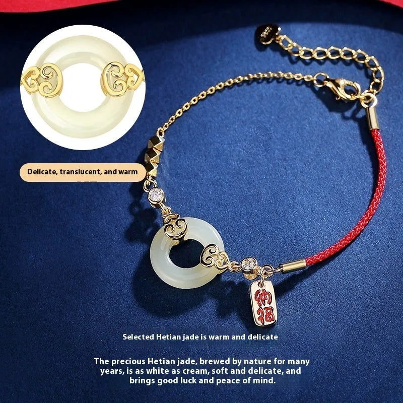 Women's Hetian jade and sterling silver Chinese jewellery set with bracelet, necklace, and earrings