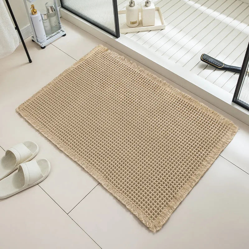 Square checkered pattern bathroom carpet with non-slip backing in beige colour, 61x92cm size