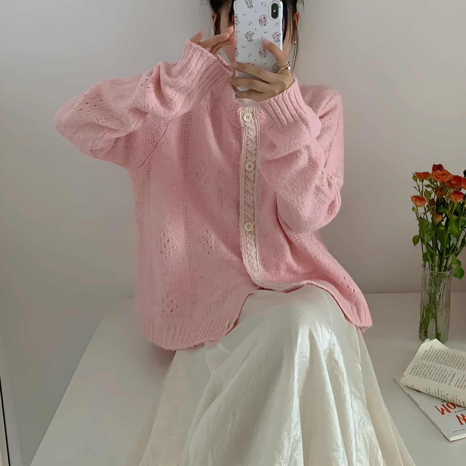 Art retro style Korean knit sweater coat cardigan in a loose free size, shown in apricot colour.