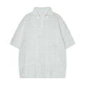 Black and white hollow knit polo shirt with short sleeves and loose cardigan fit