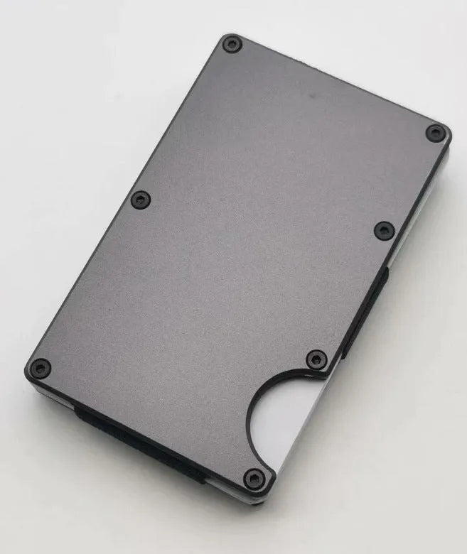 Carbon fibre credit card wallet in aluminium alloy grey with anti-theft RFID blocking, holding seven cards