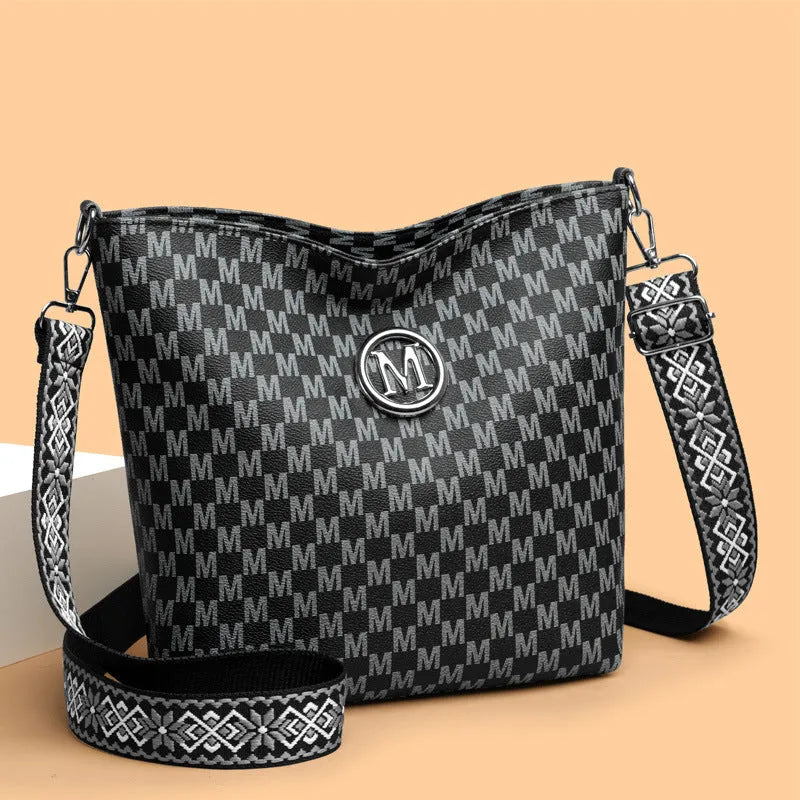 Retro dumpling-shaped PU shoulder bag in black, brown, or white with zipper change pocket