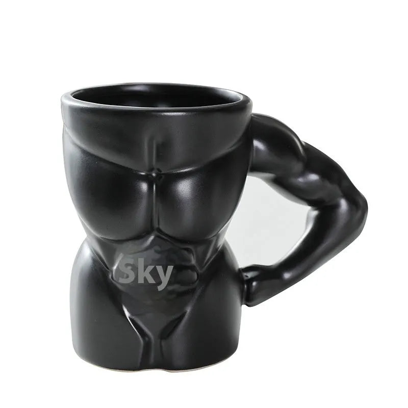 Matte black ceramic mug with muscle man design and 300ml capacity.
