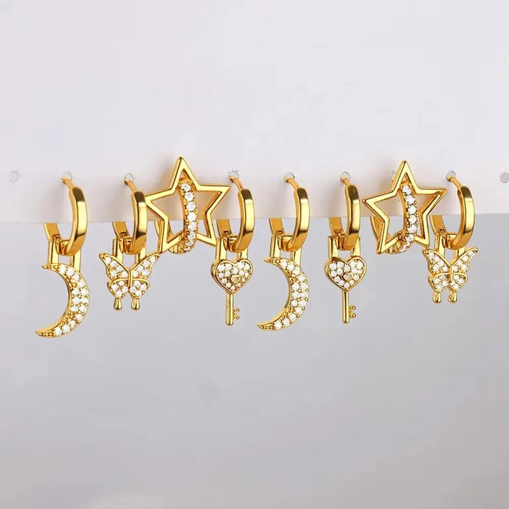 Women's irregular geometric butterfly earrings in copper with diamond treatment, showing heart-shaped and star design elements