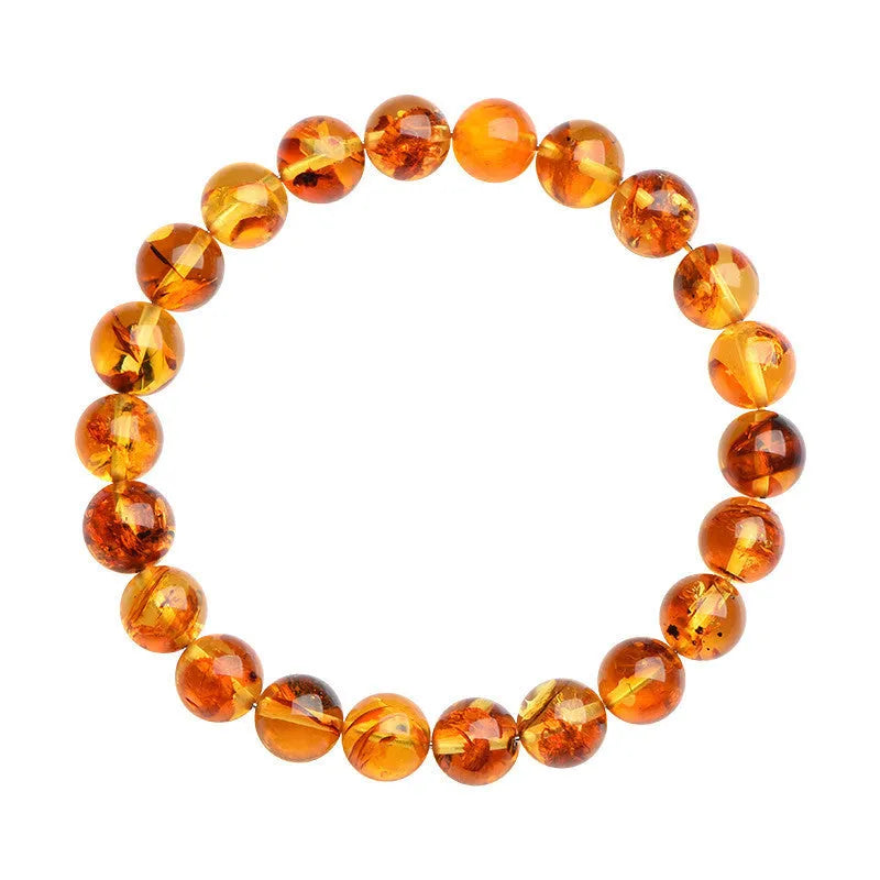 Natural yellow piebald amber bracelet with geometric beads and water purification properties