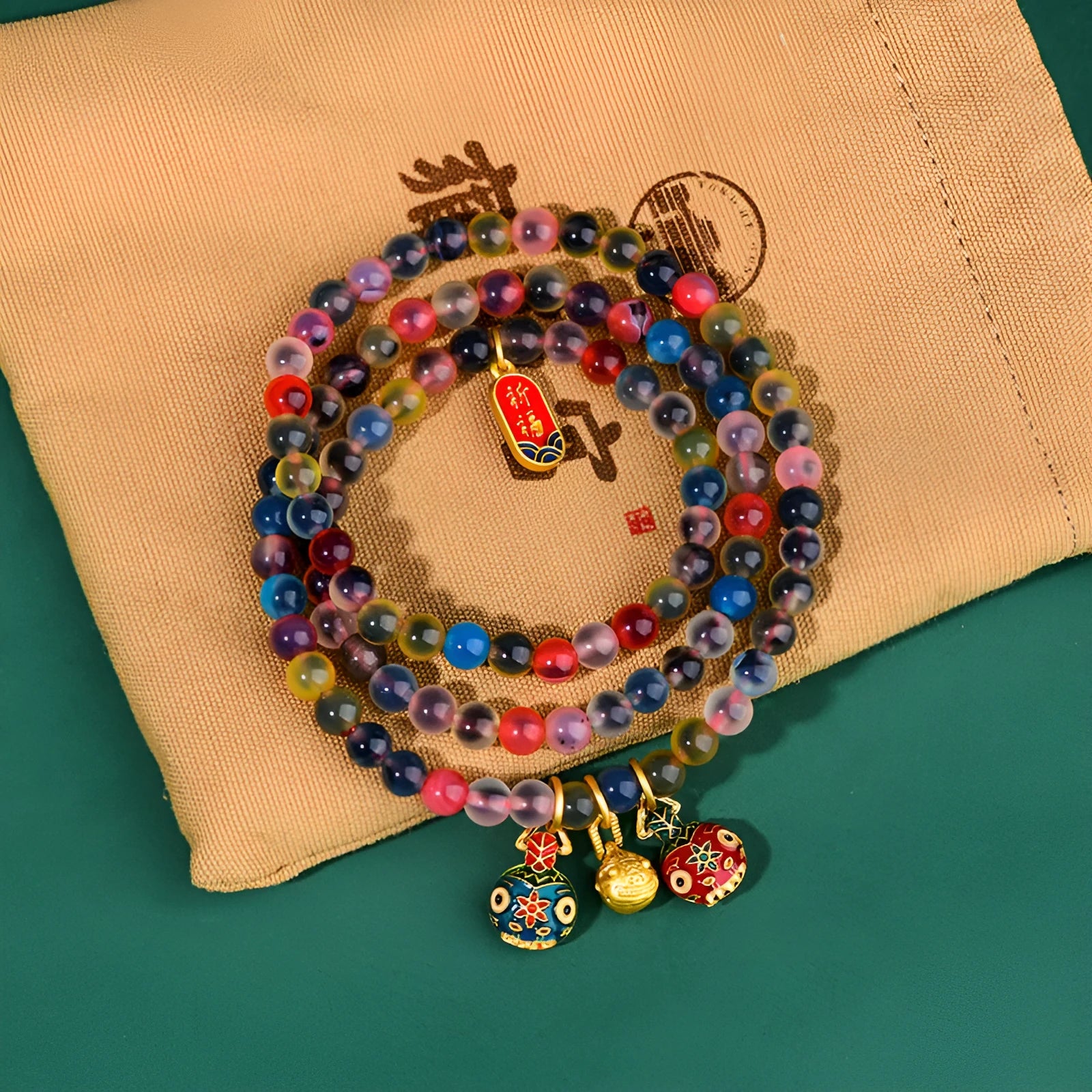 Handmade Dzogchen Agate bracelet with Sugar Heart Fragrant Gray glaze and Swallowing Gold Beast detail.
