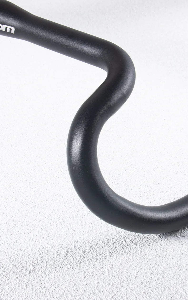 Black aluminium alloy road bike handlebar showing 420mm width and racing bend profile