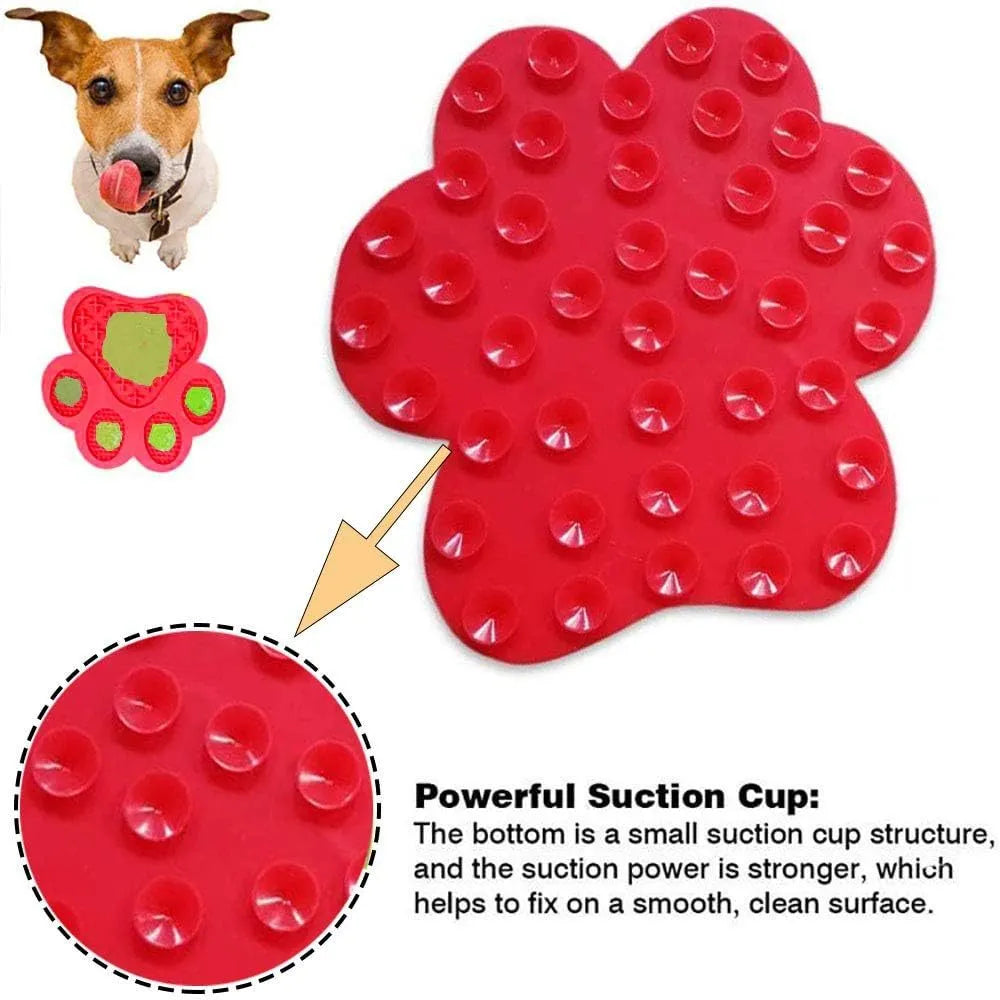 Blue silicone dog licking mat with suction cups on a tile surface, showing bone-shaped texture