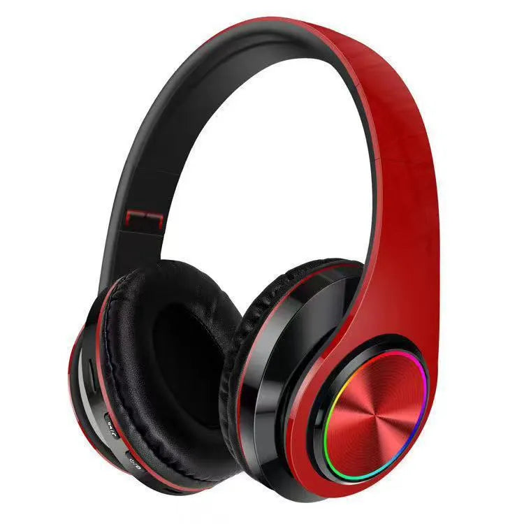Black wireless Bluetooth over-ear gaming headset with microphone on a stand.