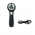 Black and silver jewellery appraisal magnifying glass with optical glass lens and USB-C cable on a table.