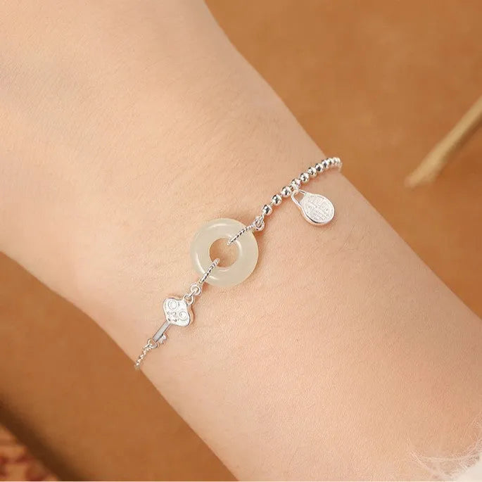 Women's 925 silver bracelet with Hetian jade elements in Chinese style geometry design