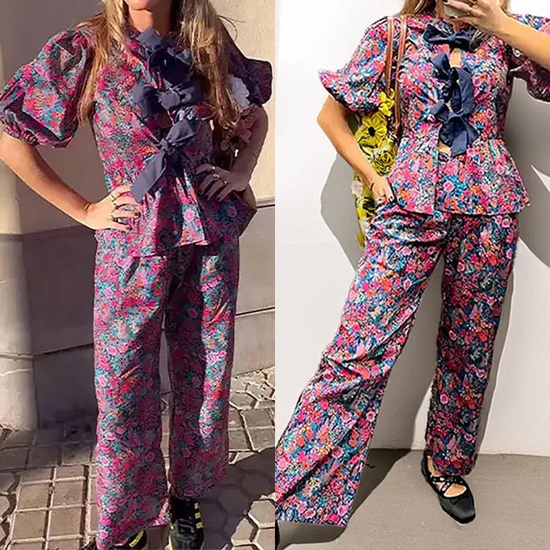 Floral tie-neck trousers suit with puff sleeves and long sleeves in pictured colour, showing top and trousers set