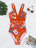 Women's floral one-piece swimsuit with backless design in black, blue, red, or rose red, showing high elasticity spandex material