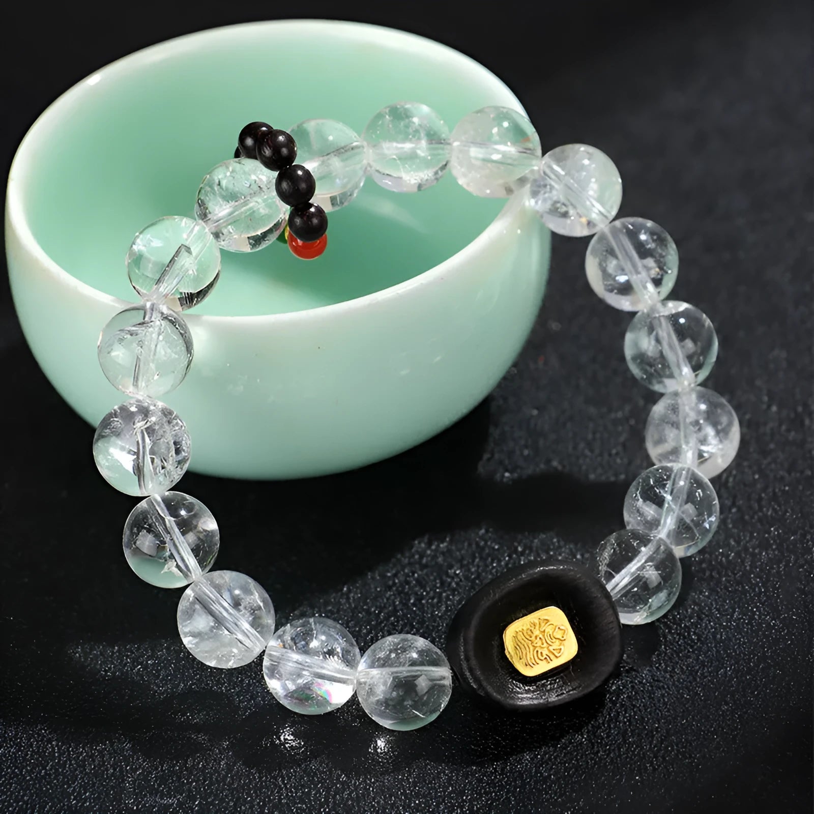 Natural white crystal ebony five warp bracelet on wrist showing wooden beads and ethnic design