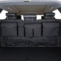 Black car boot hanging storage organiser with shopping bag compartments and waterproof Oxford cloth construction