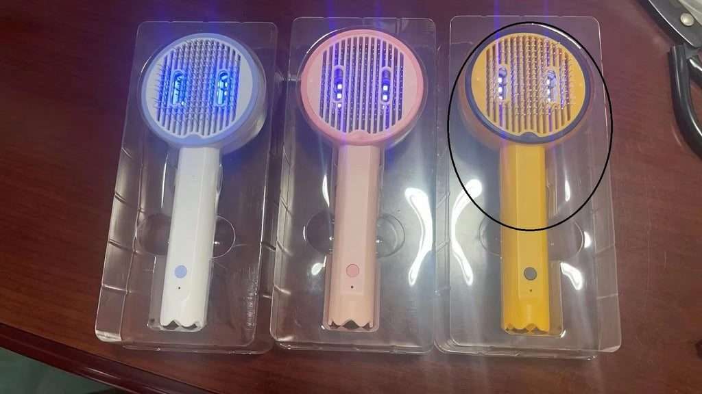 USB rechargeable UV pet comb for cats and dogs in pink, yellow or white ABS plastic.