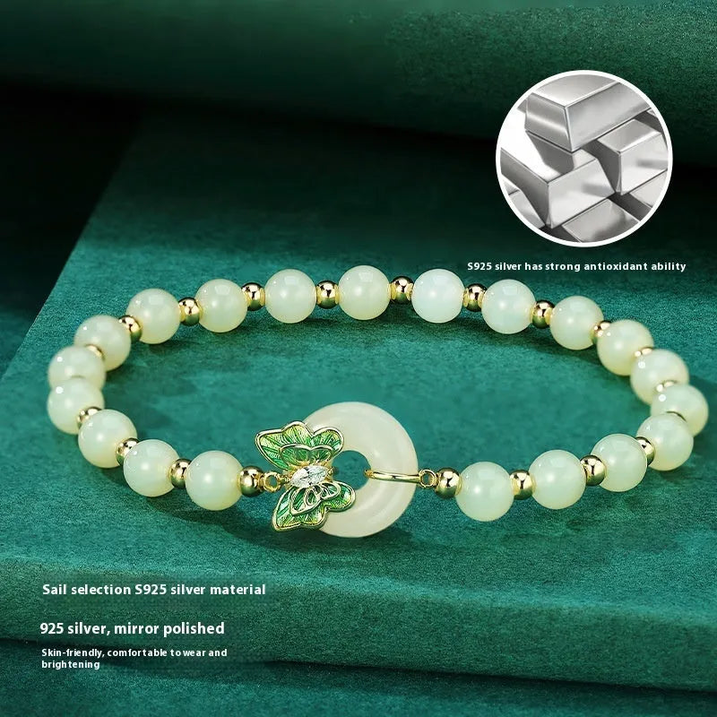 Cyan Hetian jade bracelet with sterling silver butterfly design and inlaid gemstones