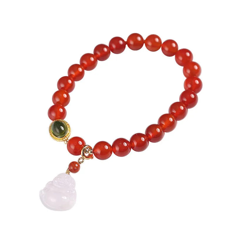 Chinese style geometric women's bracelet with red agate beads and a gold jade Maitreya Buddha pendant.
