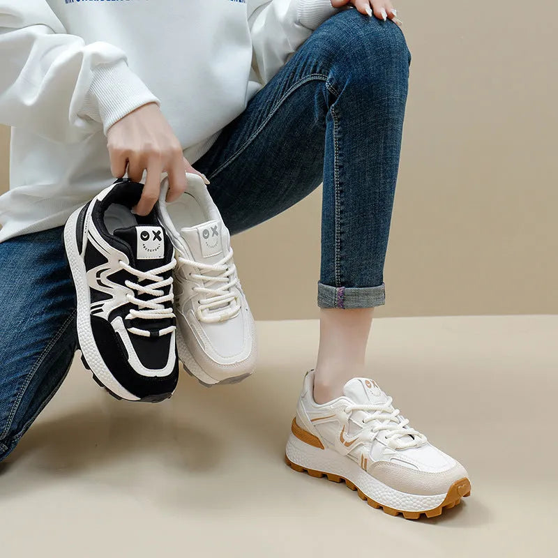 Women's grey casual lace-up shoes with round toe and flat heel on a white background.