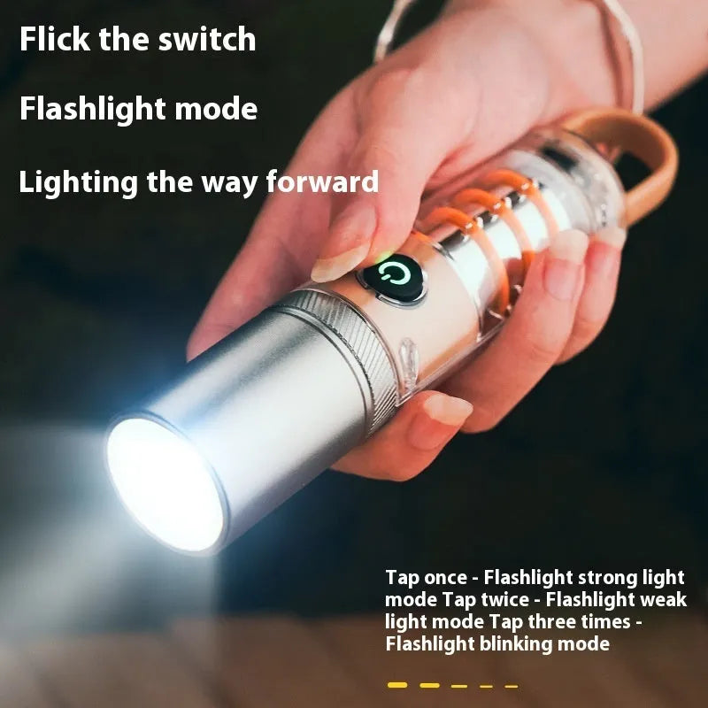 Orange or beige flashlight with dual light source, hook, and keychain, measuring 15cm in length