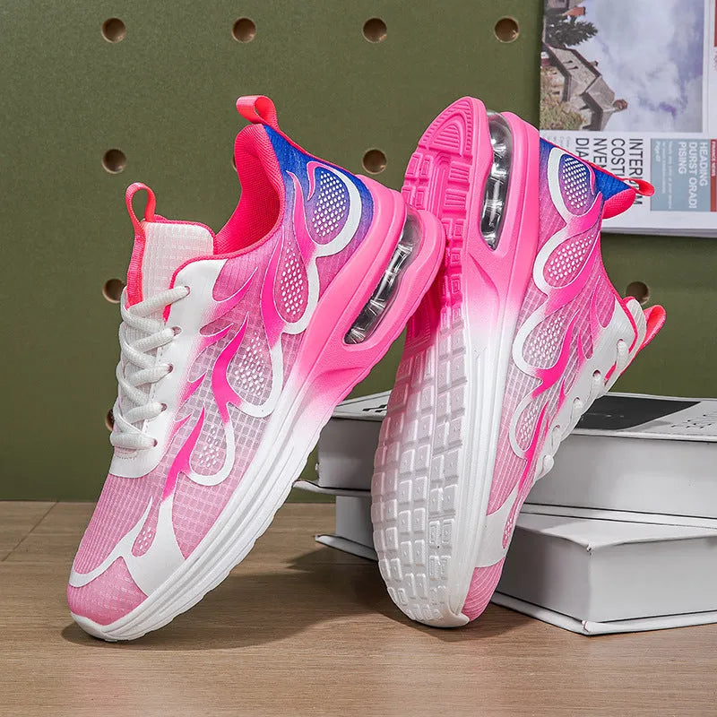 Women's pink mesh casual sneaker with lace-up front and light-coloured PU sole.