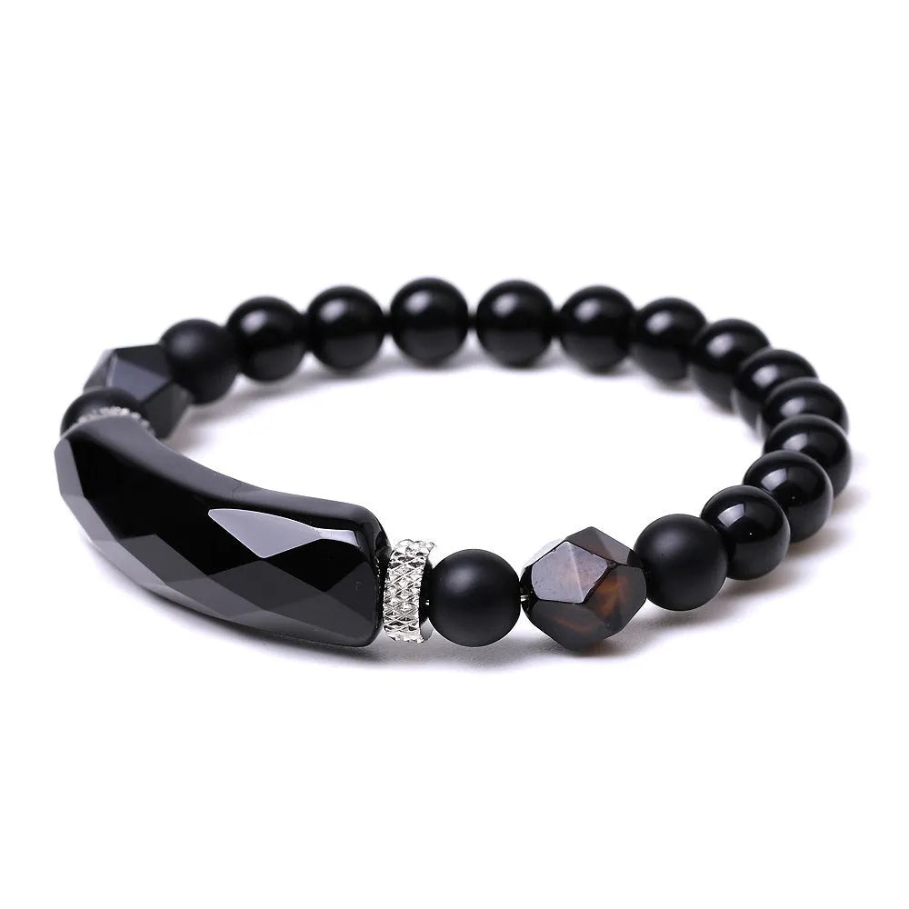 Handmade diamond-shaped cut black agate bracelet with fan-shaped design elements