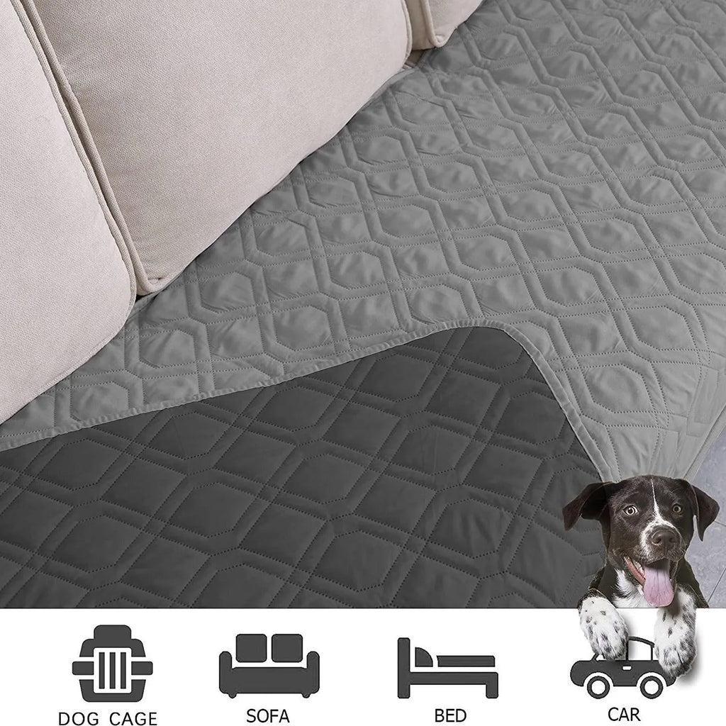 Reversible waterproof dog blanket sofa cover in grey, laid flat on a sofa