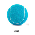 A 6.3cm pink rubber dog tennis ball sitting on grass.