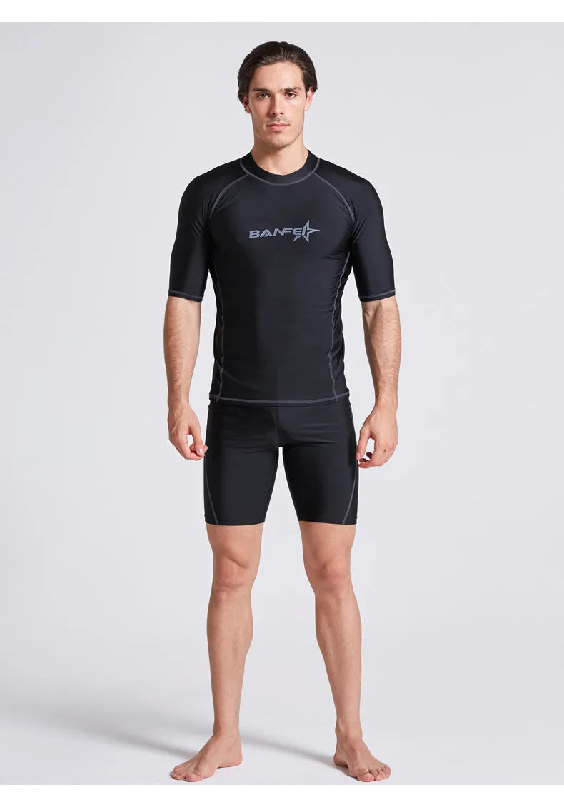 Men's blue quick-dry nylon two-piece swim set with half-sleeve top and swim pants laid flat