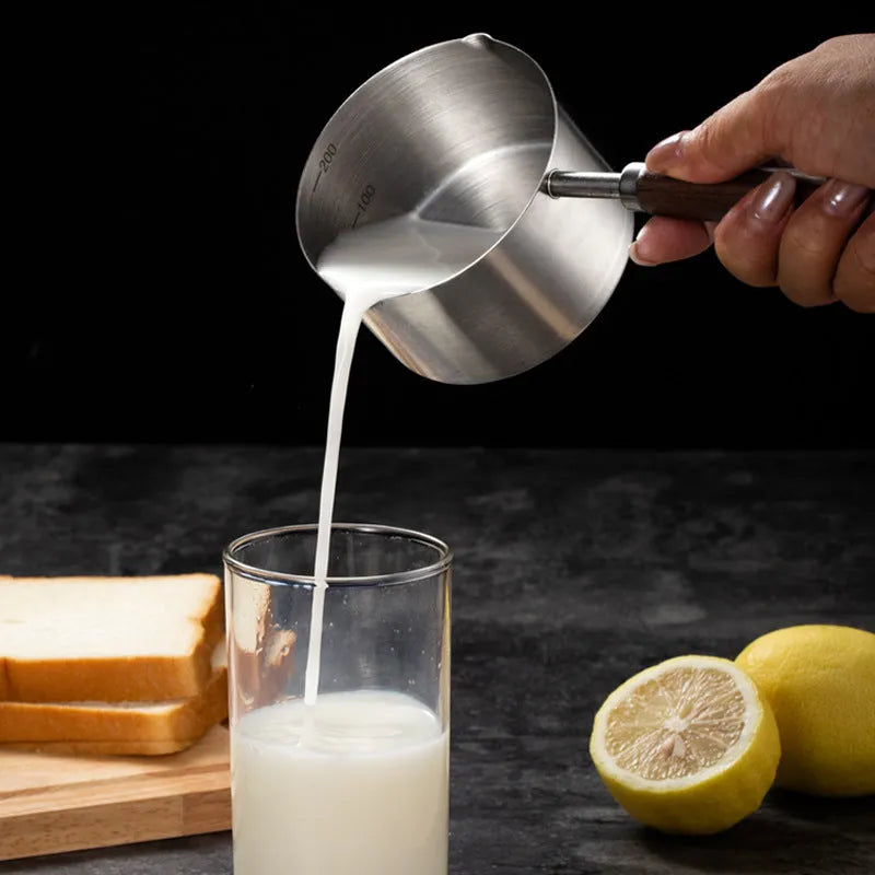 304 stainless steel dog food scoop with wooden handle and measuring cup design for dry pet food, small and large sizes available.