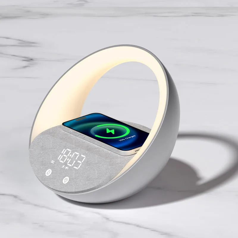 Beige multifunctional wireless charger clock with digital display, fabric speaker grille, and LED wake-up light on a wooden surface.