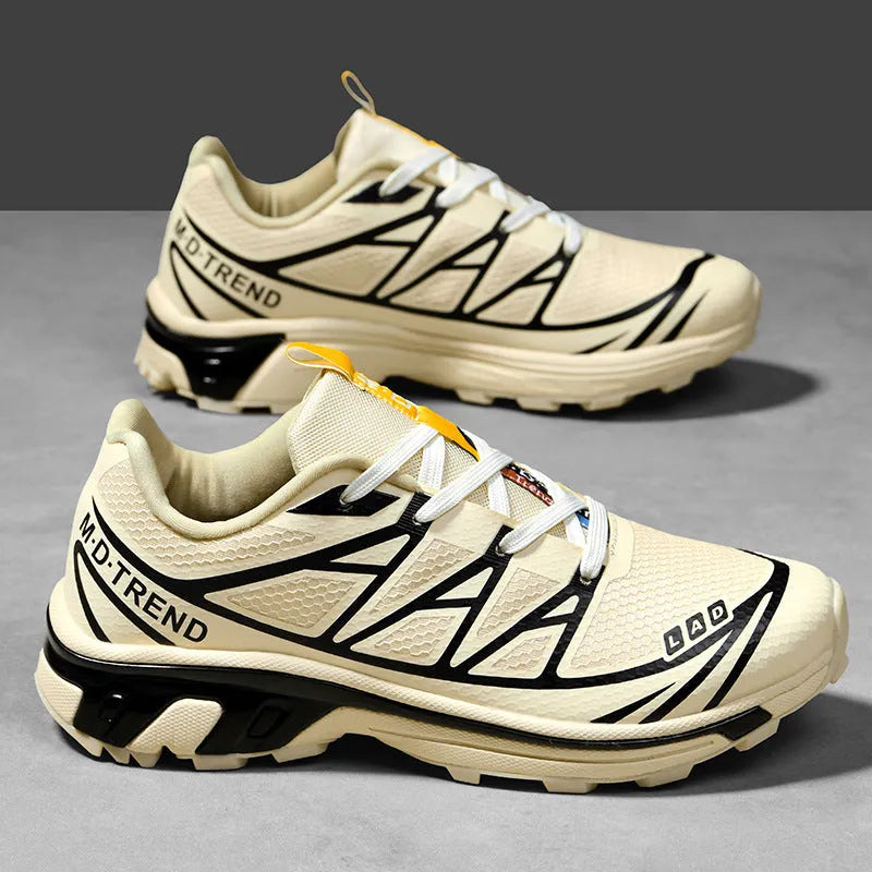 Low-top hiking shoes with mesh lining and rubber soles in khaki colour with front lace-up design
