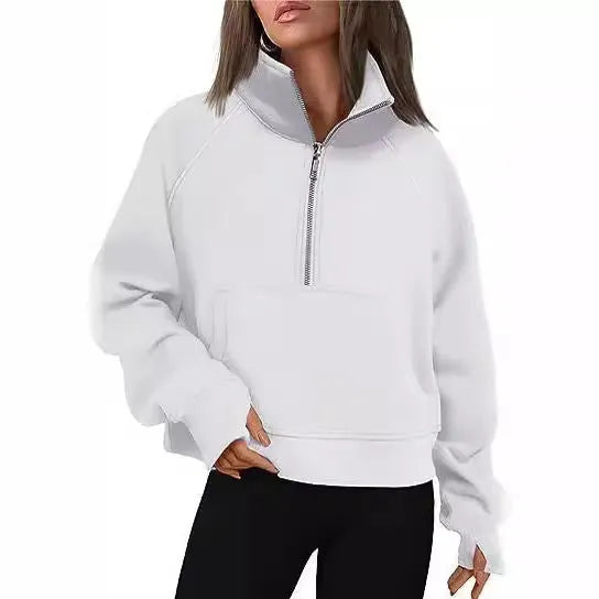 Women's loose fit lapel sweater with fleece lining and long raglan sleeves in a solid colour.