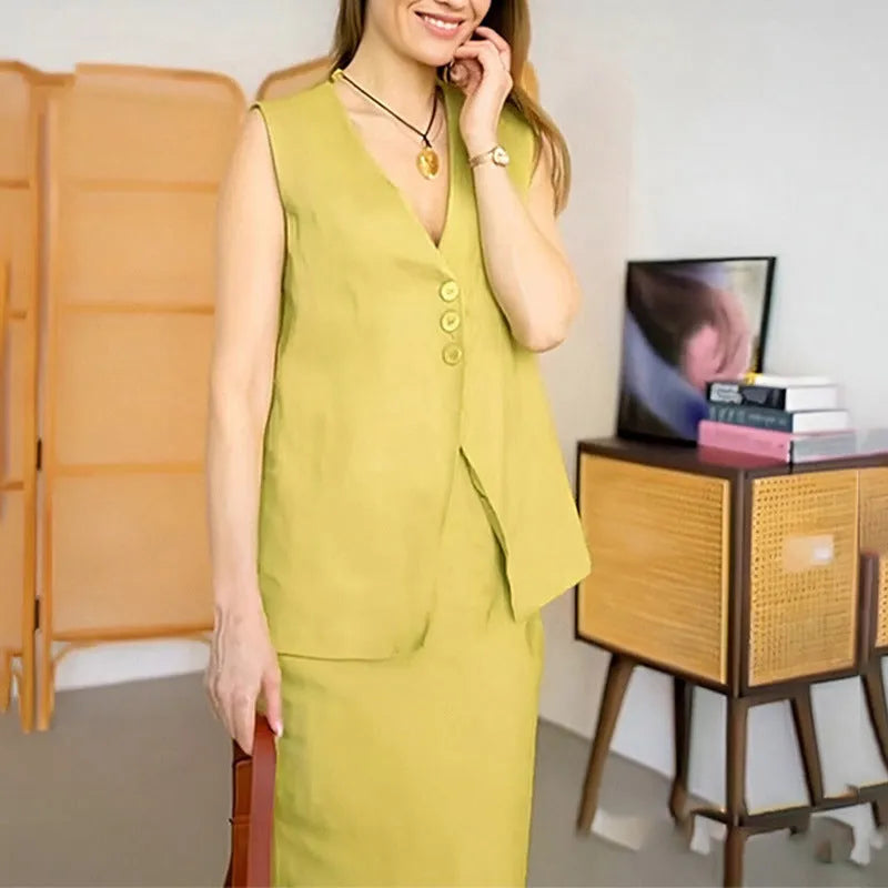 Casual loose top long skirt two-piece suit in blue, featuring a sleeveless vest and long skirt made from polyester fabric.