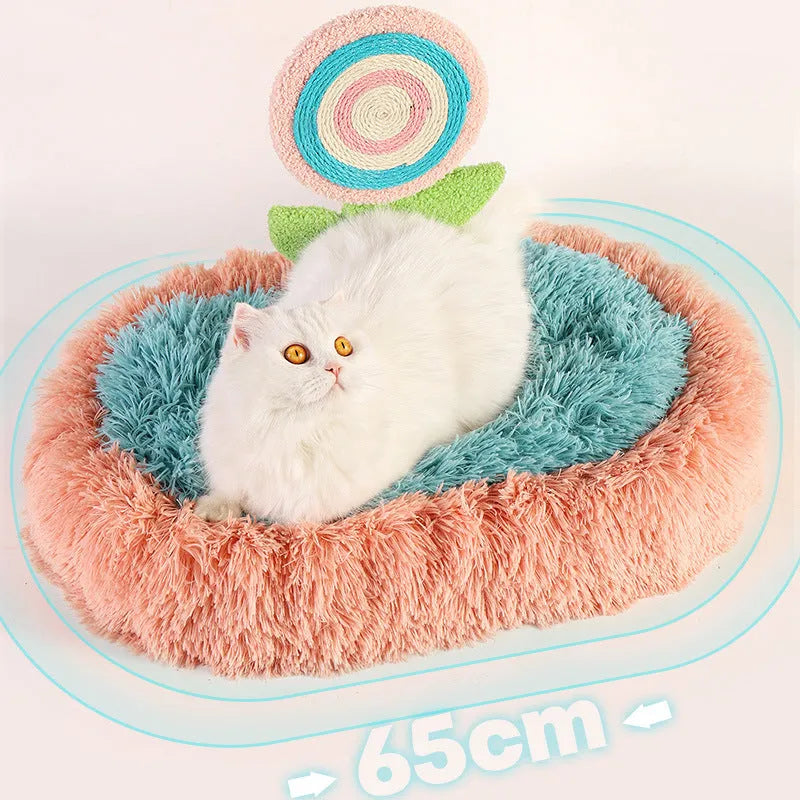 Pink elliptical lollipop shaped plush cat bed with raised sides, showing a removable cover.