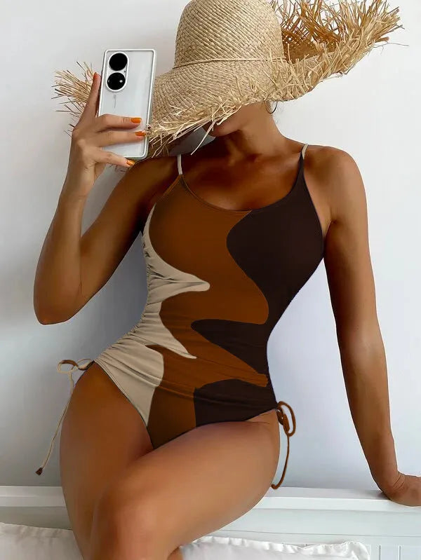 Women's one-piece swimsuit in blue colour with sleeveless and backless design for swimming