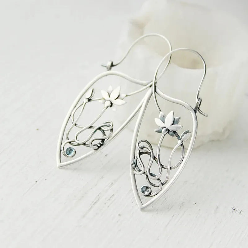 Silver lotus vine earrings with geometric retro design and round elements for women