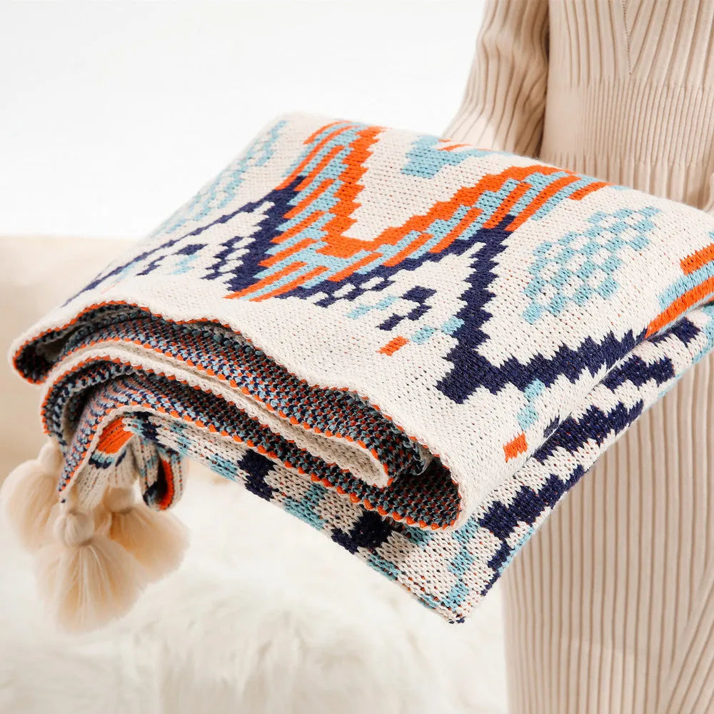 Bohemian sofa cover blanket with tassel trim in geometric pattern, dimensions 130cm width, available in multiple lengths and colours.