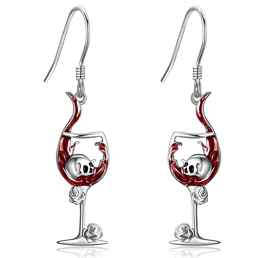 Close-up of zinc alloy Halloween earrings featuring a combined skull and wine glass design with an electroplated metallic finish.