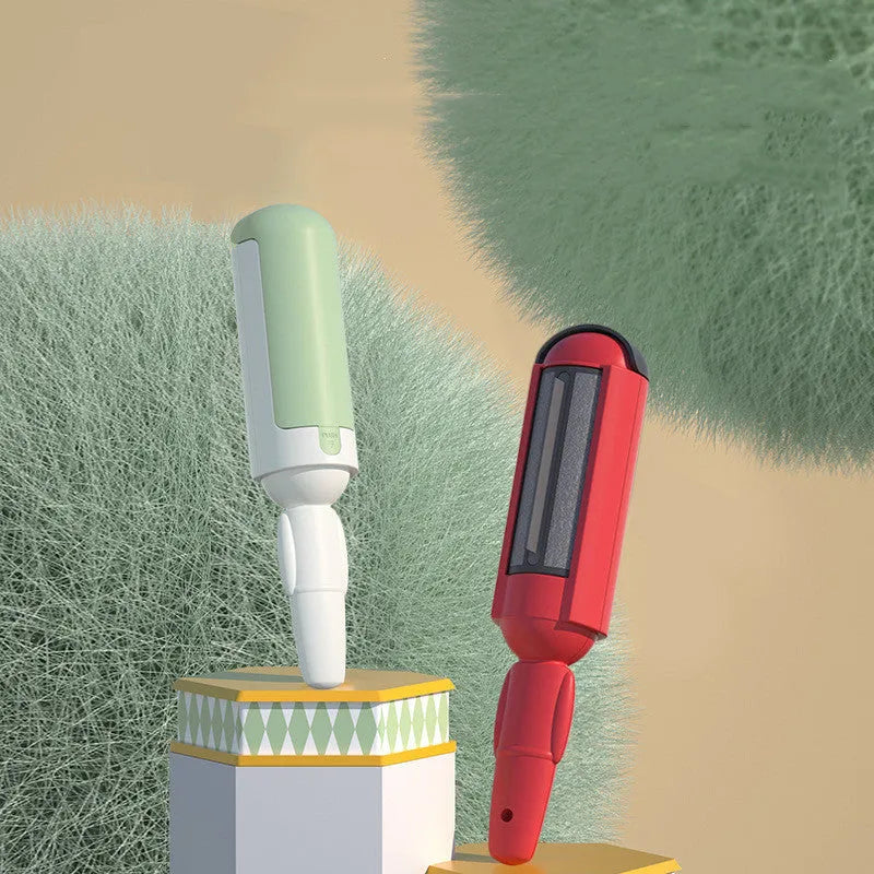 White green coloured pet hair remover roller with a non-slip handle on a fabric sofa.