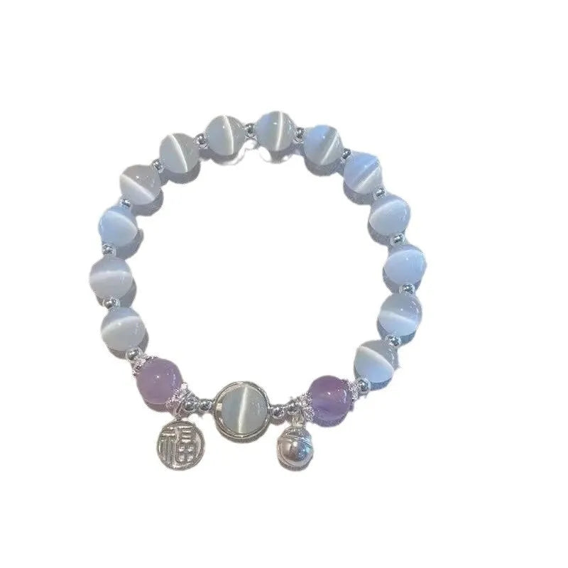 Glass butterfly bracelet for women with drop shape design and round decorative elements in moonlight grey colour