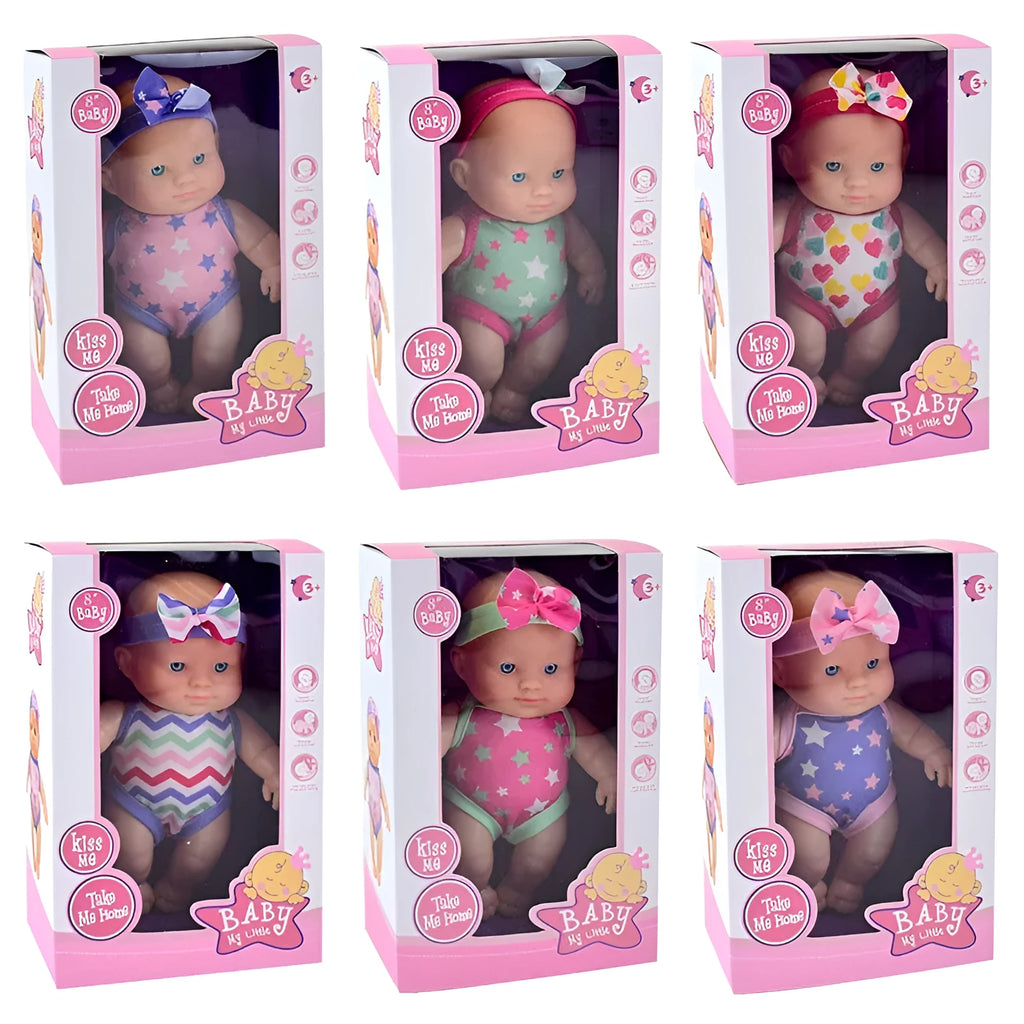 Simulation baby vinyl figurine doll displayed on a surface, showing detailed features.