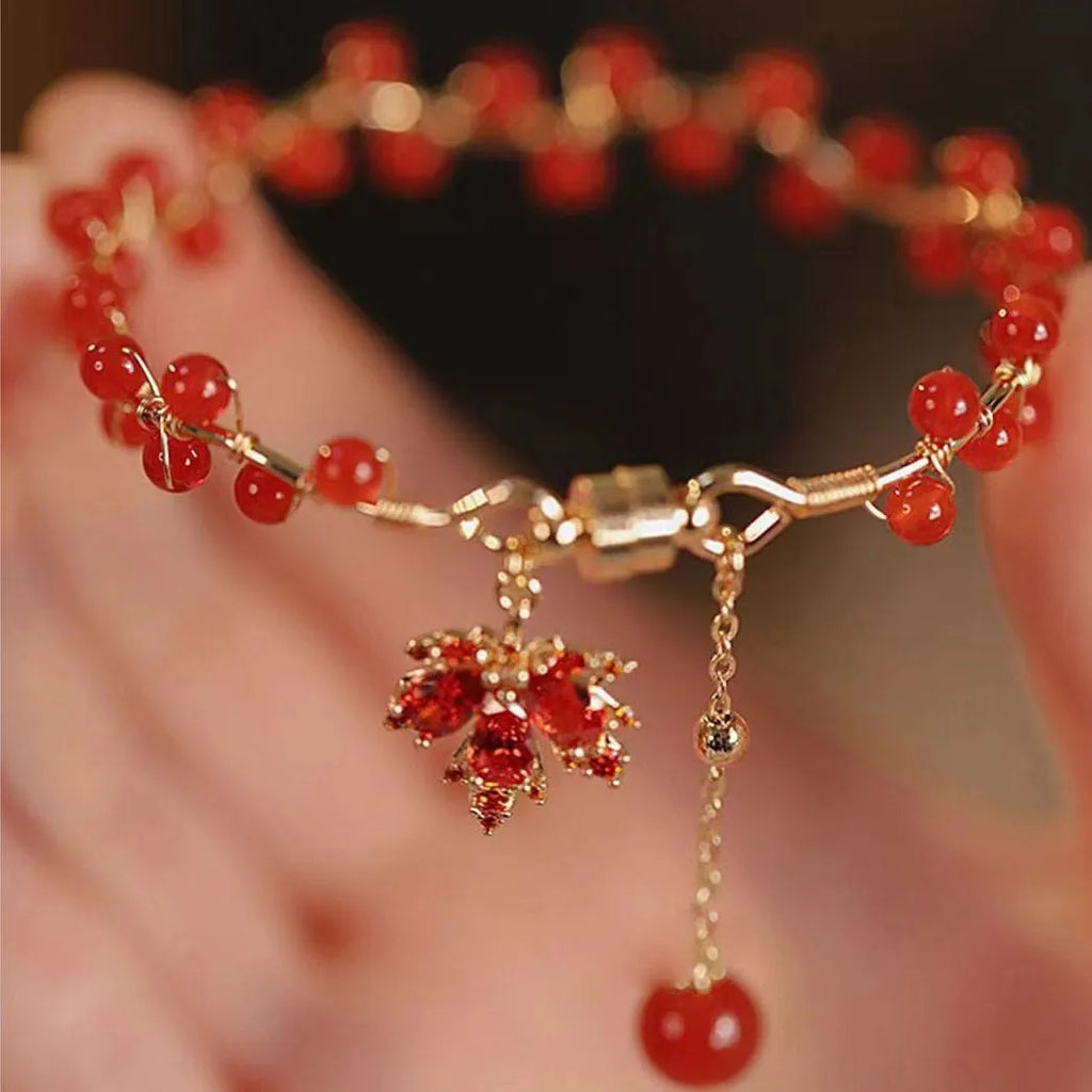 Red electroplated alloy bracelet with Chinese style maple leaf design and magnetic closure for girls